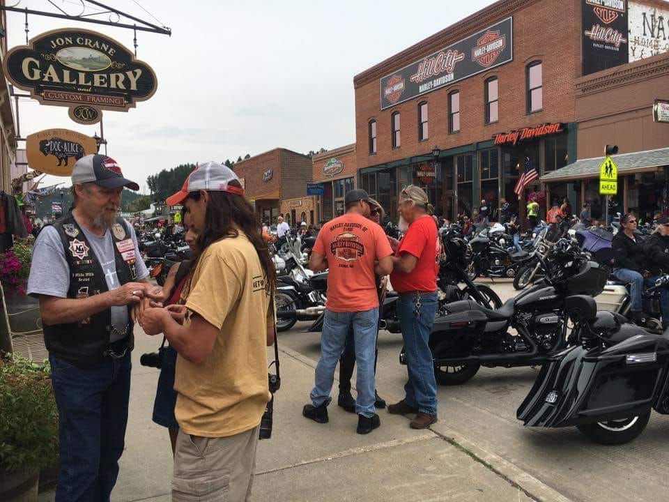 Sturgis - booth time - sharing Jesus with the crowd in Hill City SD